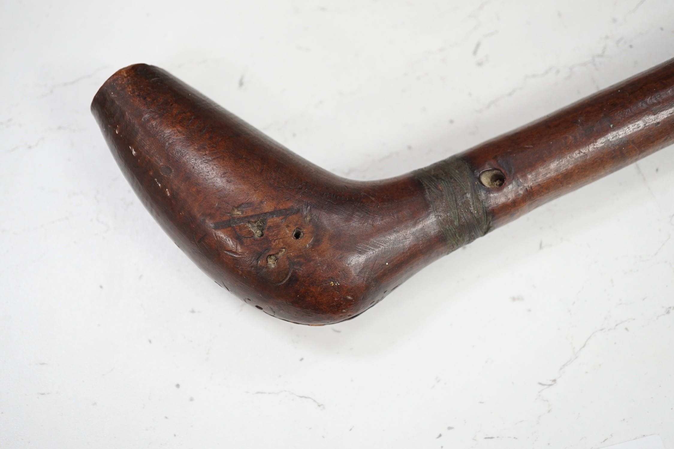 A Polynesian wood throwing club, 40cm tall